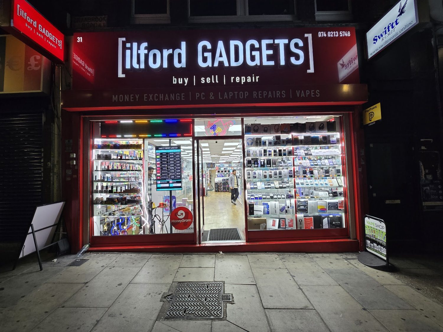 Ilford Gadgets at 31 Cranbrook Road from the street, windows full of phones and accessories.